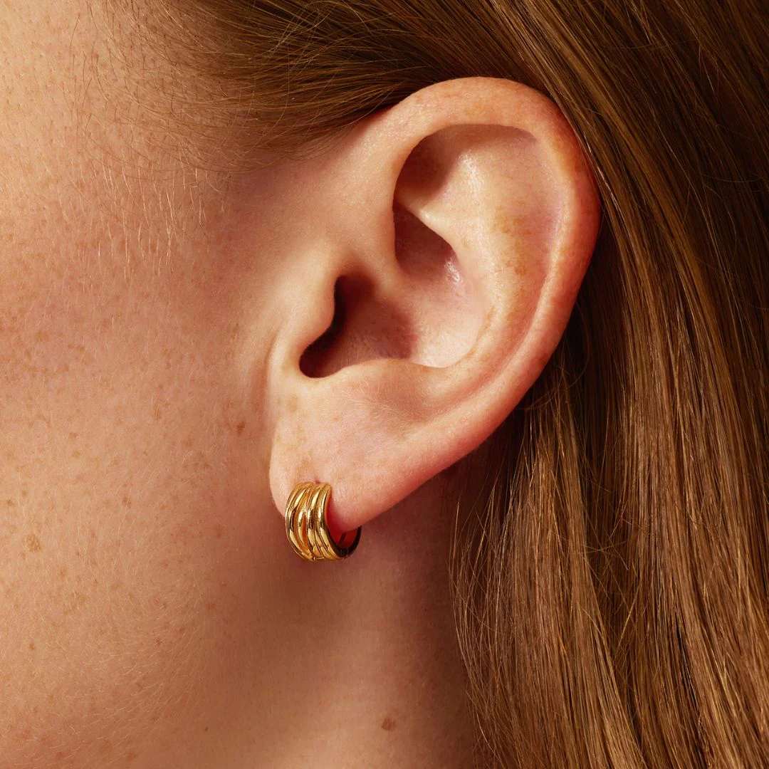 Gold Chunky Ribbed Huggie Hoop Earrings - Image 2