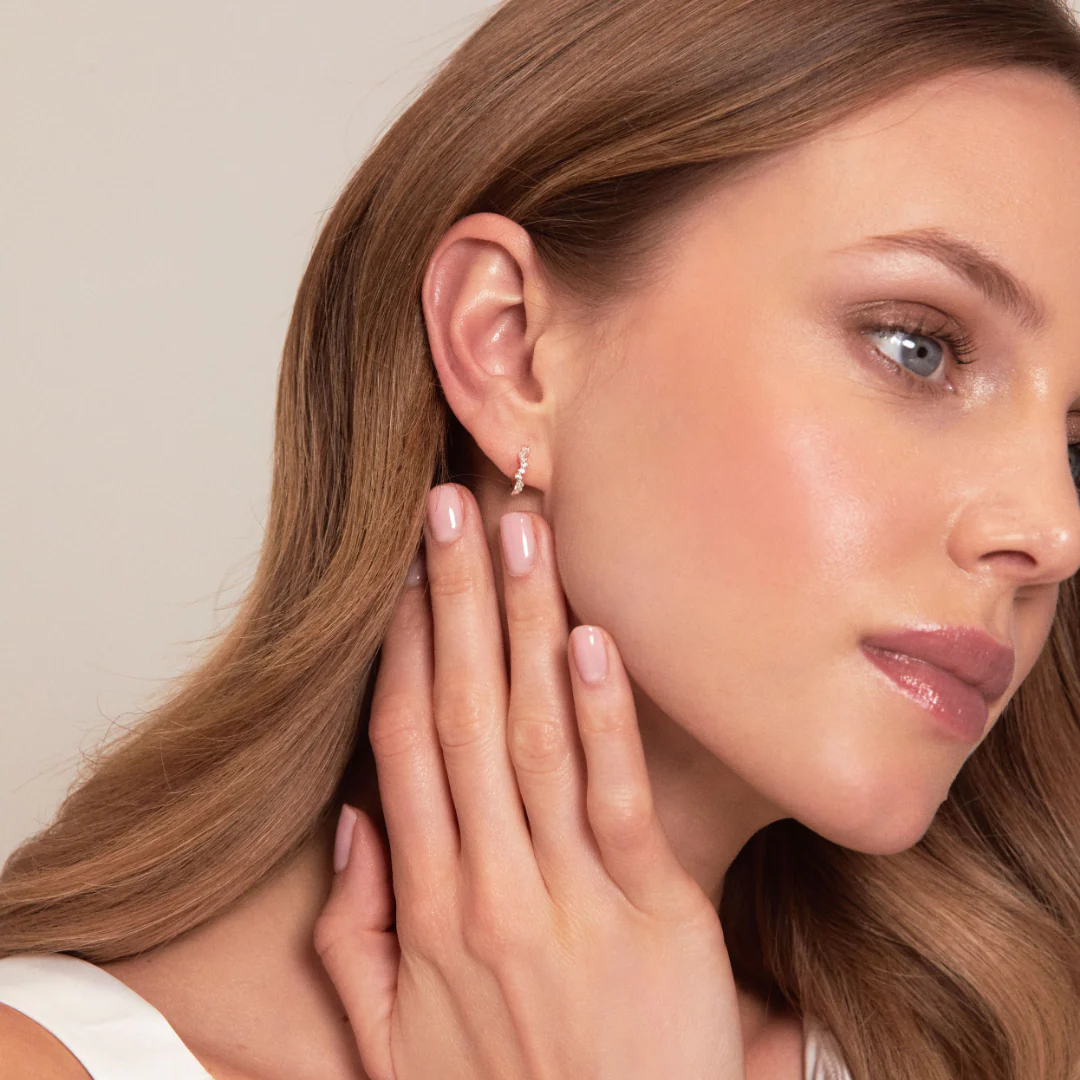 Gold Curved Diamond Style Huggie Hoop Earrings - Image 3