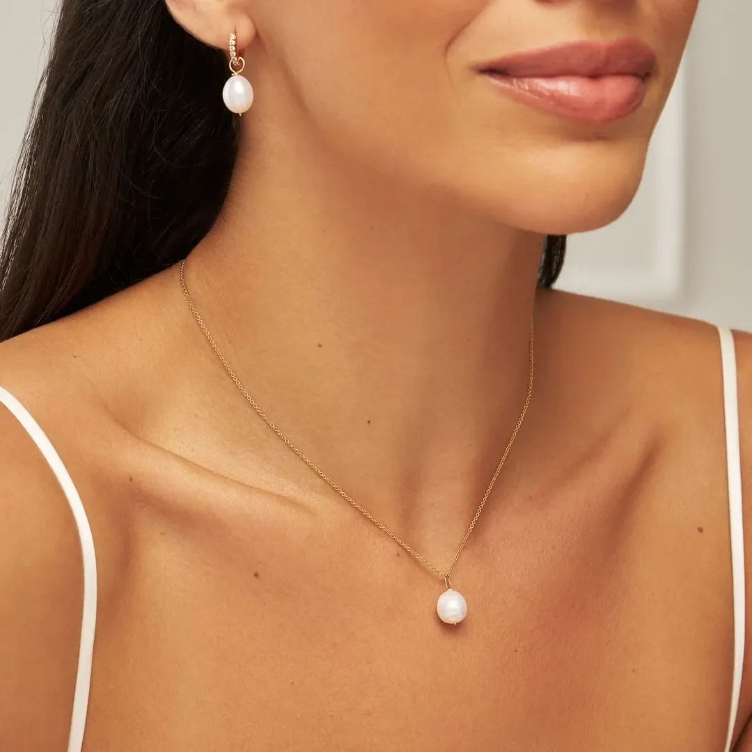 Gold Huggie Pearl Drop Earrings - Image 5