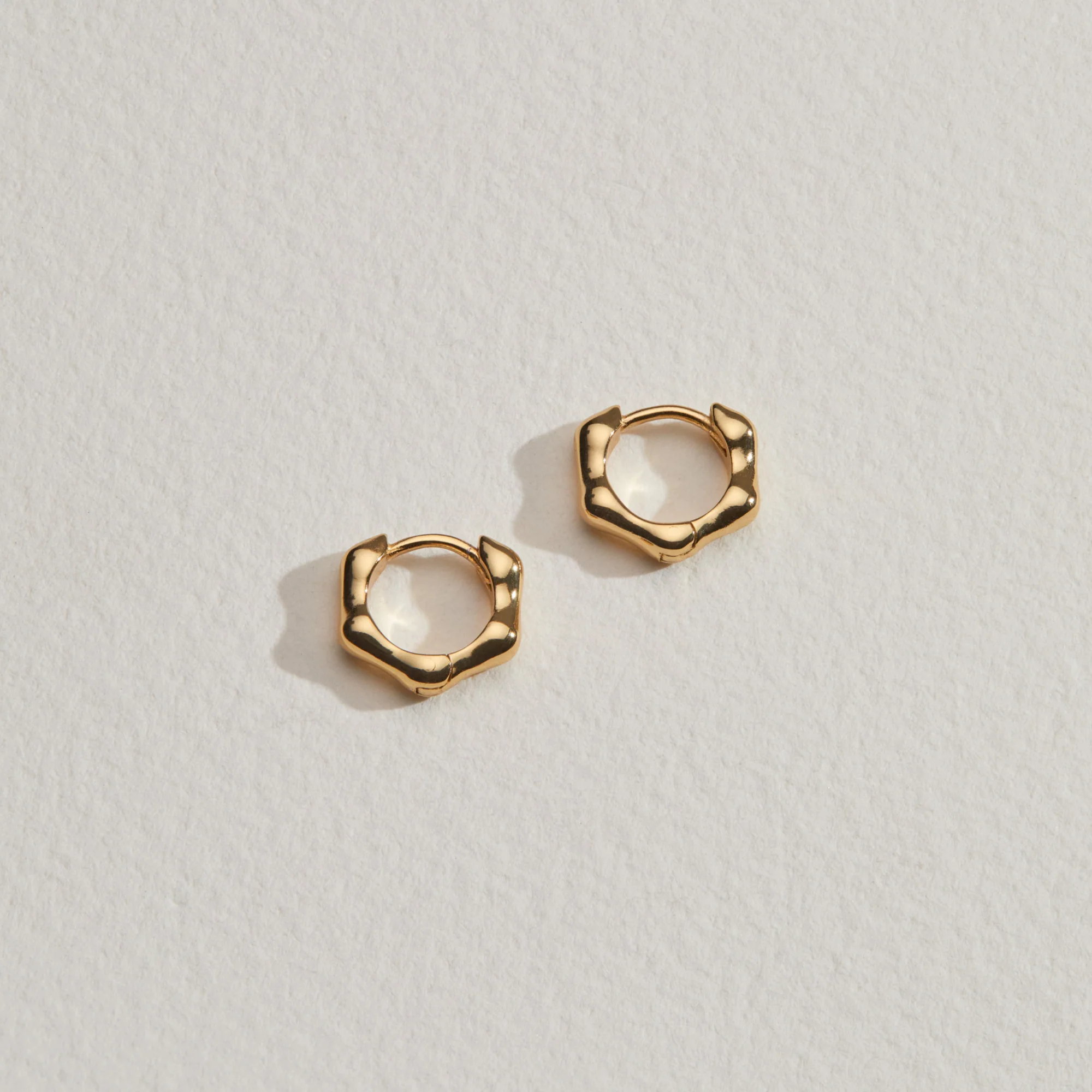 Gold Molten Huggie Hoop Earrings - Image 3
