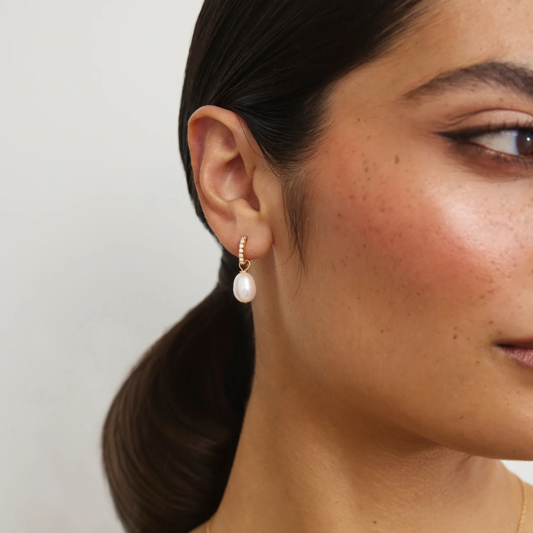 Rose Gold Huggie Pearl Drop Earrings - Image 2