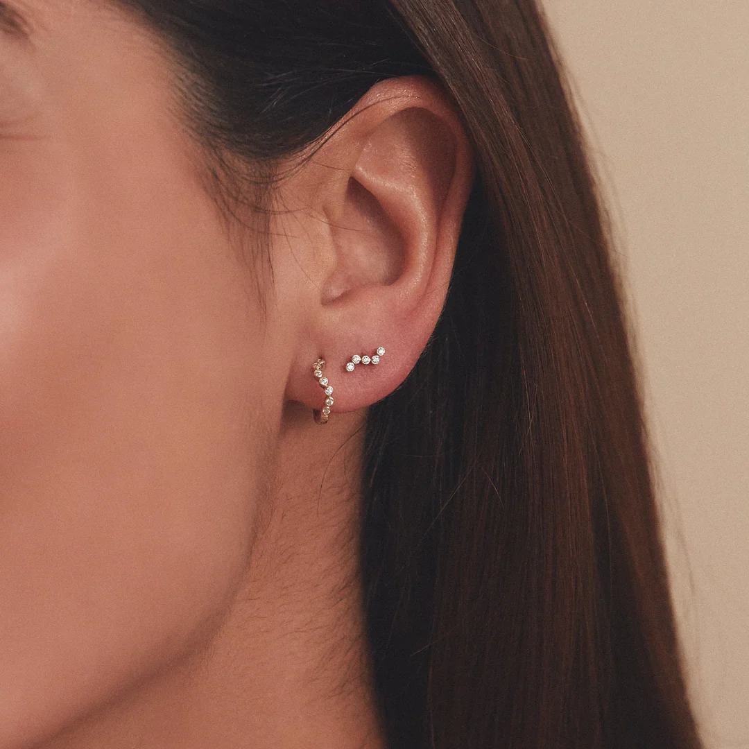 Silver Diamond Style Wave Stud Earrings - Image 2