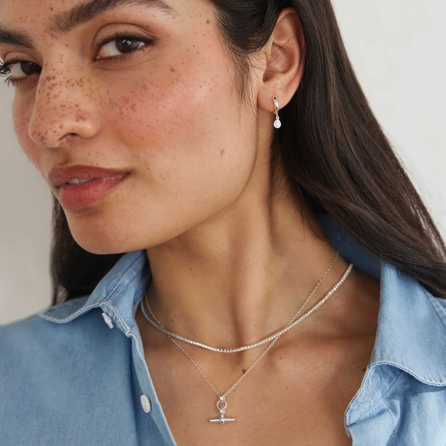 Silver Mini Teardrop Huggie Hoop Earrings - Image 3