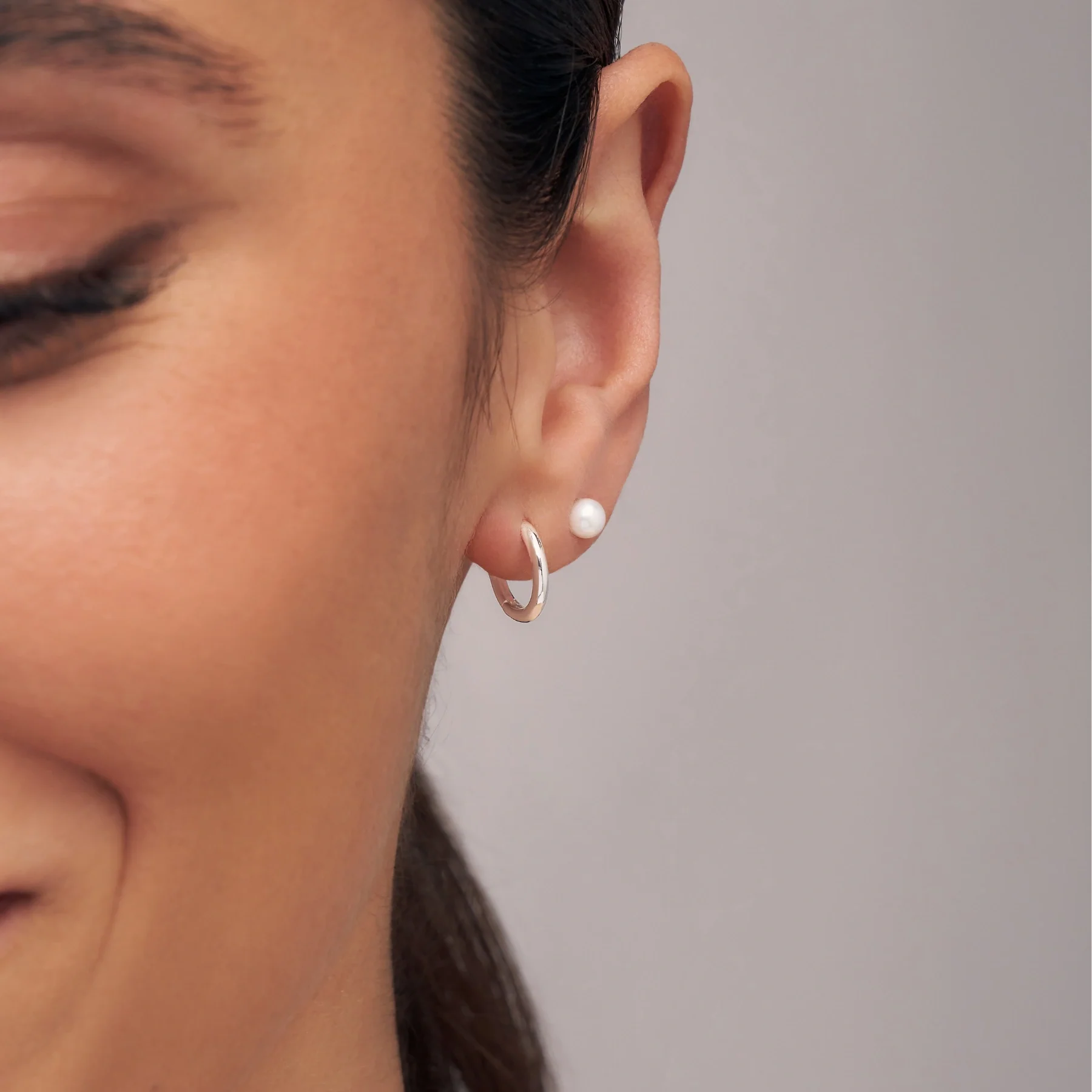 Silver Tiny Pearl Stud Earrings - Image 2
