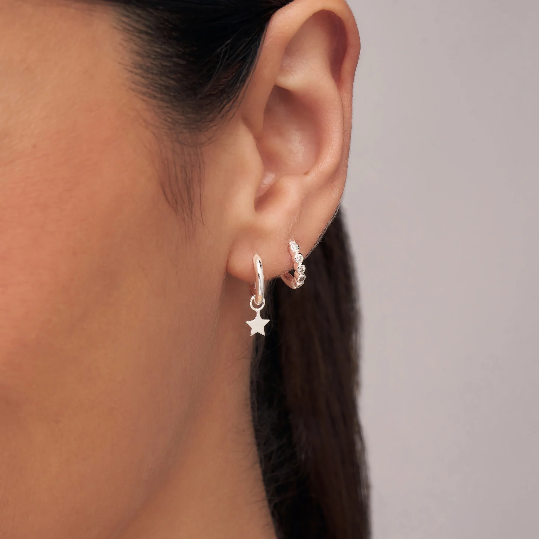 Silver Tiny Star Hoop Earrings - Image 3