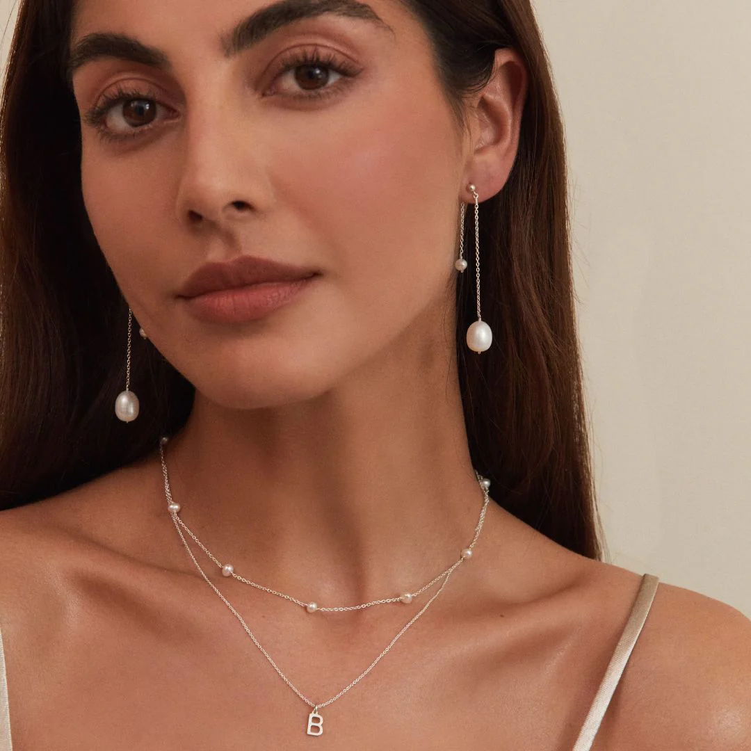 Solid White Gold Layered Large and Small Pearl Earrings - Image 3