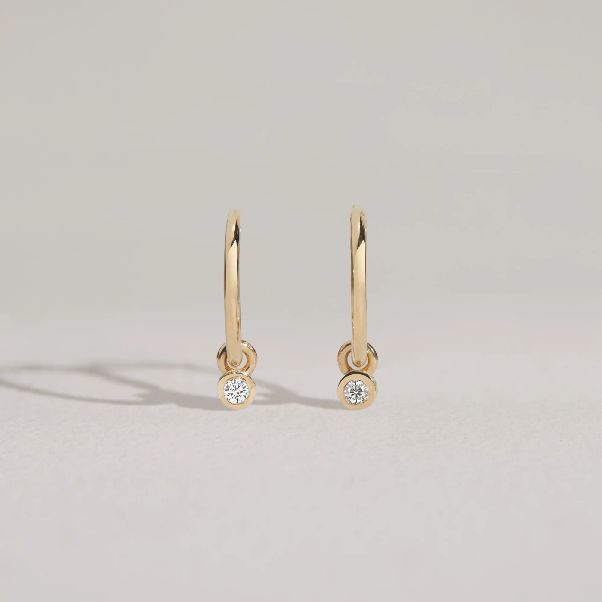 Solid White Gold Mini Floating Diamond Hoop Earrings - Image 4